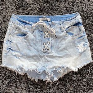 Light wash denim lace up shorts